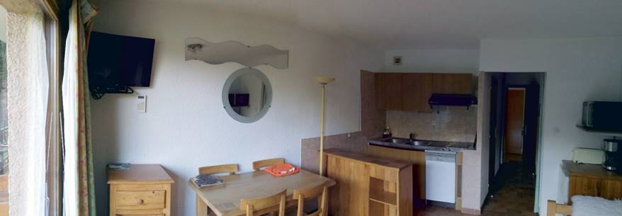A room filled with furniture and a house

Description automatically generated